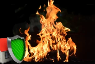 Ilustração de casa protegida por escudo e chamas ao redor, simbolizando seguro incêndio.